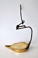 Tran Lampe, 
Dänemark, 18. 
Jahrhundert. In 
Messing und 
Eisen. Höhe: 29 
cm. Schüssel: 
12 x 8 cm.