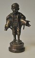 Bronzefigur 
eines Jungen 
mit zwei 
ferkeln Unter 
Den Armen. 
Dänemark des 
20. 
Jahrhunderts. 
Ohne ...