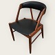 Stuhl aus 
Teakholz mit 
Bezug aus 
schwarzem 
Kunststoff. 
Dänische 
Moderne aus den 
1960er Jahren. 
...