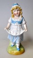 Bisquitvase mit 
Mädchenfigur, 
Deutschland, 
19. Jh. 
Kaltbemalung in 
Pastellfarben. 
H: 15 cm. B: 9 
...