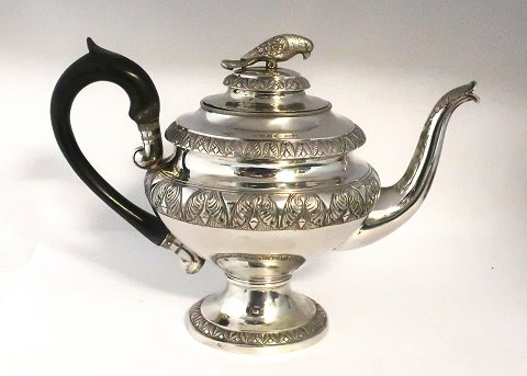 Erik Christensen Lind, Horsens. Silver teapot (830). Decorated with a bird on 
the lid. Height 20 cm. Produced approx. 1860.