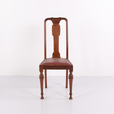 Esszimmerstühlen aus dunklem Holz und rotem Leder aus den 1920er Jahren