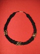Halskette mit 
Perlen aus 
Stein und Blut 
vergoldeten 
kugler.længde: 
59 cm.
 einwandfreiem 
Zustand
