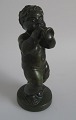 Hjort Figur des 
Trompetenspiels 
Cherub, grün 
glasiertem Ton, 
20. Jahrhundert 
H:.. 22 cm. 
Nr.: ...