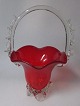 Venezianischem 
Glas-Vase in 
Form eines 
Korbes, 20. 
Jahrhundert. 
Klare und rotem 
Glas. H:. 28 
cm.