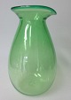 Danish Vase / 
Kanne in grünem 
Glas, 20. 
Jahrhundert. 
Unterzeichnet. 
H:. 17.5 cm.
