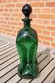Cluck Karaffe 
oder Cluck 
Flasche aus 
dunkel-grün 
Glas mit 
angeschlossenem 
Hals, von 
dänischen ...