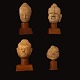 Vier 
Buddha-Köpfe, 
Terracotta
Hergestellt in 
der Periode 
11-1300
H: 21-32cm