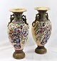Paar 
japanischen 
Satsuma Vasen. 
19. 
Jahrhundert. 
Fayencen. 
Polychrome 
Dekoration von 
Blumen und ...