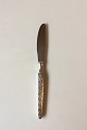 Harlekin ABSA 
sølvplet 
Spisekniv fra 
Københavns 
Ske-Fabrik 
Måler 21,9 cm 
/ 8,62 in.