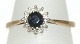 Gold ring with 
diamonds and 
sapphire, 9 
carat gold
White gold 
Socket
Stamp: 375
Ring ...