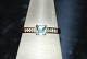 Gold Ring with 
Diamonds and 
Aquamarine 9 
Carats
Stamp: 375
Size 56 / 
17.82 ...