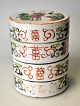 Chinesischer 
Speisebehälter 
aus Porzellan, 
19. Jh. Familie 
Rose. Seiten 
verziert mit 
...