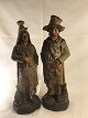 Zwei 
Terrakotta-
Figuren in Form 
eines armen 
Mannes und 
seiner Frau, 
letzte Hälfte 
des 19. Jh. ...