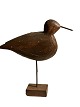 Skulpturaler 
und dekorativer 
Vogel aus Holz 
geschnitzt und 
auf einem 
Holzständer 
stehend. ...