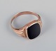 Henry Roland, Danish goldsmith. 14 karat gold ring with onyx.Mid-20th century.Marked 585 H. ...