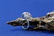 Beautiful and 
simple gold 
ring in 14 
carat gold and 
beautiful clear 
stones. The 
many stones ...