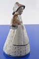Bing & Gröndahl 
Figur, Frau in 
Anzug Nr. 7205, 
Höhe 24 cm. 
Tadelloser 
Zustand 1. 
Wahl. Aus der 
...