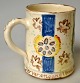 Andersen-Høyer, 
Kay (20. 
Jahrhundert) / 
Anders Høy, 
Dänemark: 
Becher. 
Polychrom 
bemaltes Ton. 
...