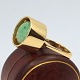 Flemming Lund; 
A 14 kt. gold 
ring with jade 
Ring size 52.
Stamped "K.Ja. 
585".
Danish design 
...