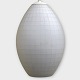 Oval white glass lamp with checkered pattern.
DKK 475