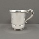 A children cup of hammered hallmarked silver, 1930.H. 7 cm. Diam 6,7 cm.A Danish children ...