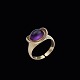 Hans Hansen. 
Ring i 14k guld 
med ametyst.
Tegnet og 
udført hos Hans 
Hansen, 
Kolding.
Stemplet ...