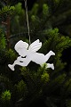 Old Christmas 
tree ornament 
in the shape of 
a little angel 
playing a 
trumpet in 
pearly white 
...