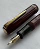 Burgundy Big Ben no. 30 fountain pen. Push button filler. Doesn't work. A new rubber sack must ...