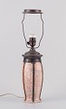 German 
ceramicist. Art 
Nouveau table 
lamp made of 
ceramic.
Glaze in light 
and brown-green 
...