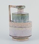 P. Garnier, 
Enghien, French 
ceramicist.
Ceramic jug. 
Art Deco shape.
Polychrome 
crystal glaze. 
...