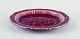 Wilhelm Kåge 
for 
Gustavsberg.
“Argenta” 
ceramic dish.
Rare bordeaux 
...