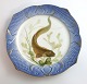 Royal 
Copenhagen. 
Angelgestell 
Nr. 19. Modell 
3002. 
Durchmesser 
22,5 cm. 
Mustela marina 
...
