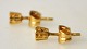 Ein Paar 
Ohrstecker aus 
18 Karat 
Rotgold, 20. 
Jahrhundert, 
mit Diamanten 
im 
Brillantschliff.
 Stempel