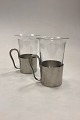 Just 
Andersen/Holmegaard 
A pair of 
Pewter Cups 
with Glass No. 
2504. Measures 
13 cm / 5.11 
in.
