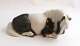 Königliches 
Kopenhagen. 
Porzellanfigur. 
Liegendes Pony. 
Modell 4611. 
Länge 13 cm. (4 
Wahl)