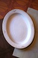 Rare oval Royal 
Copenhagen 
serving dish in 
Princess with 
gold 
decorations. 
37x30cm. 
Decoration ...