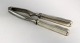 Georg Jensen. 
Silberbesteck 
(925). 
Dobbeltriflet. 
Nussknacker. 
Länge 17 cm.