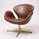 The Swan, model 
3320 
manufactured by 
Fritz Hansen 
and designed by 
Arne Jacobsen. 
It is ...