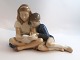 Königliches 
Kopenhagen. 
Porzellanfigur. 
Lesende Kinder. 
Modell 4670. 
Länge 19,5 cm. 
Höhe 13,5 ...
