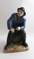 Royal 
Copenhagen. 
Porzellanfigur. 
Der alte 
Fischer aus 
Skagen. Modell 
489. (1 Wahl). 
Höhe 21 cm.