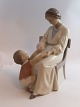 Bing & 
Gröndahl. 
Porzellanfigur. 
Mutter und 
Kind. Modell 
1642. Höhe 23 
cm. (1 Wahl).