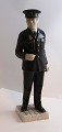 Bing & 
Gröndahl. 
Porzellanfigur. 
Polizist. 
Modell 2436. 
Höhe 31,5 cm. 
(1 Wahl).