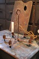 Old swedish 
wrought iron 
candlestick for 
6 candles that 
can either 
stand on a 
table or be 
hung ...