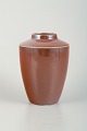 Unknown ceramic 
artist.
Unique ceramic 
vase with glaze 
in brown tones.
Perfect ...