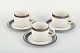 Arabia, three 
"Karelia" 
coffee cups 
with matching 
saucers in 
ceramic. One 
large cup and 
two ...