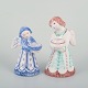 Two Hjorth 
ceramic 
candlesticks in 
the shape of 
angels, 
executed in 
glazed faience 
and ...