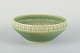 Michael 
Andersen bowl.
Michael 
Andersen 
stoneware bowl 
in green glaze 
with 
relief-
decorated ...