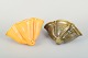 Kähler ceramic 
wall vases.
Two Kähler 
ceramic wall 
vases shaped 
like seashells, 
one in orange 
...
