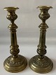 A pair of brass 
candlesticks 
with round 
feet.
Height. 27.5 
cm.
With normal 
wear and tear, 
neat ...